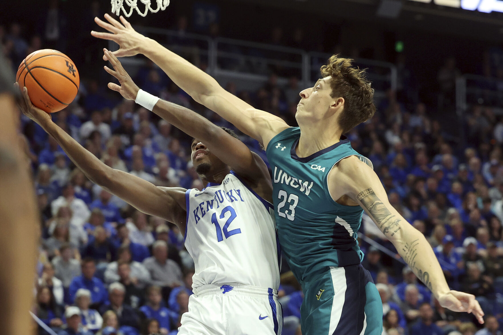 Trazarien White's 27 points leads UNC-Wilmington over No. 12 Kentucky 80-73